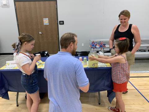 Emily showing some judges her yummy lemonade!!